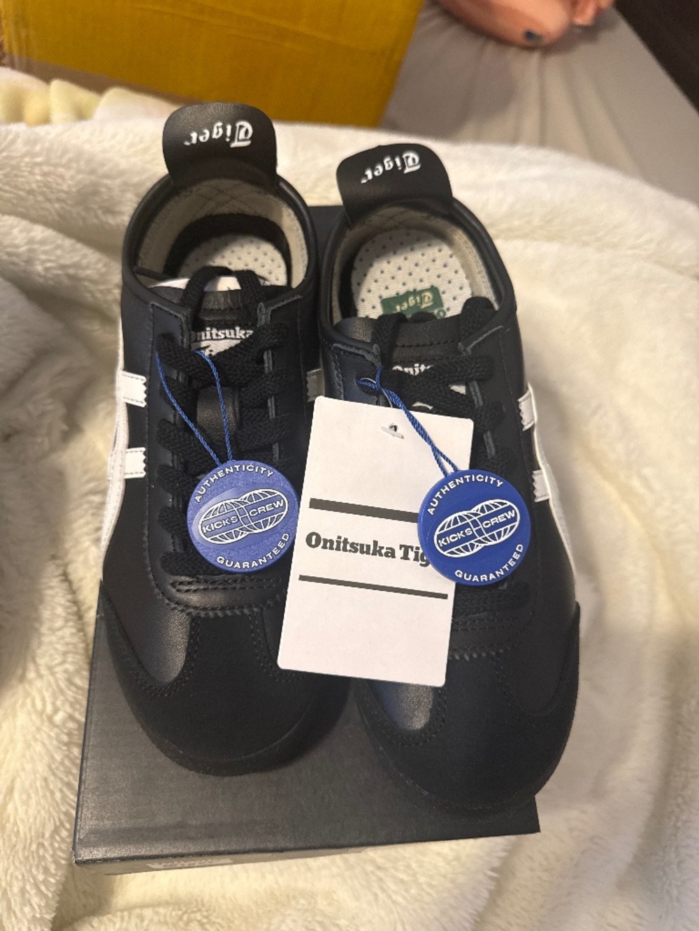 Black and white Onitsuka Tiger shoes